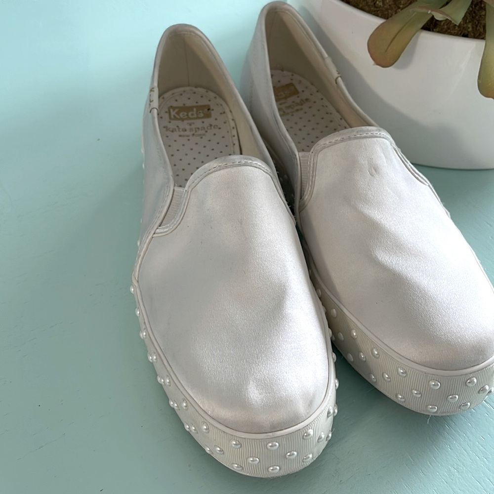 kate spade Pearl White Slip-On Sneakers with Pearl Stud Sole